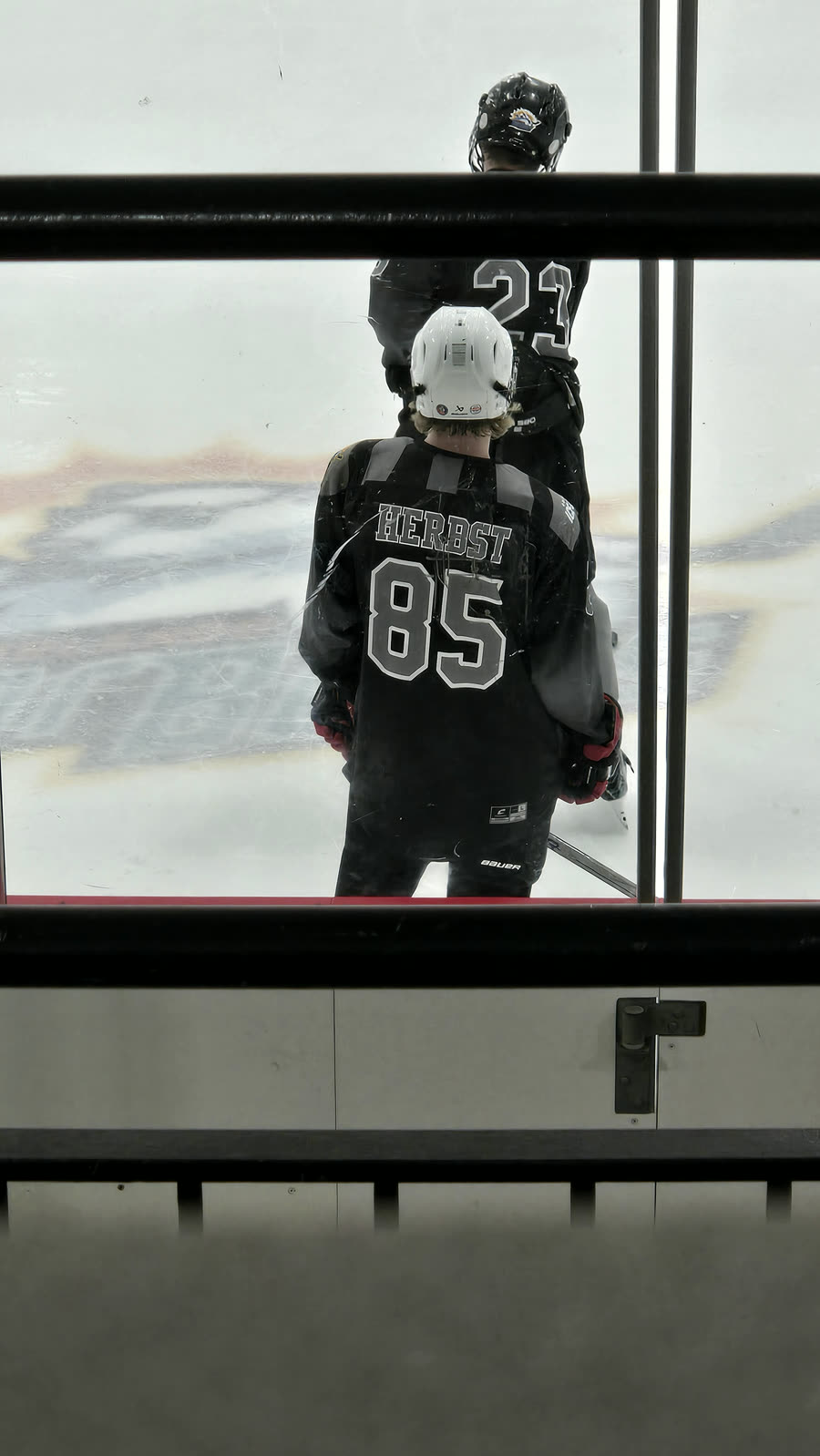 Beckett Herbst wearing his hockey jersey on the ice